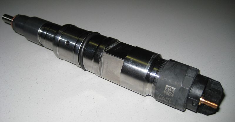 Bosch common-rail diesel fuel injector on a white background